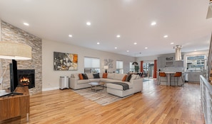 Chic warm comfort awaits in our stylish first-floor living space with gas fireplace!