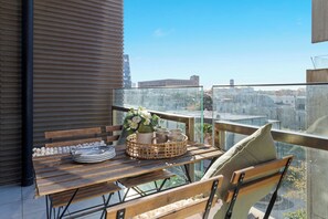 A balcony with a setting.