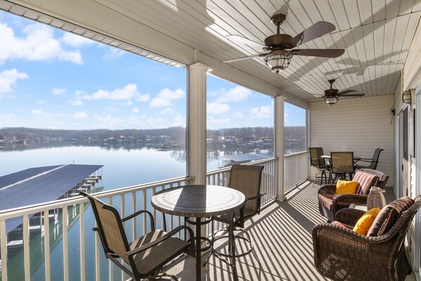 Sit back and let the gentle breeze embrace you as you relax on the deck.