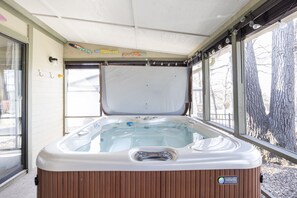 The hot tub is the "hottest' amenity of this Tan Tar A home!