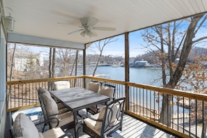When the summer sun demands some shade, step into the covered balcony for lakeview dining.