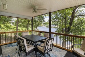 When the summer sun demands some shade, step into the covered balcony for lakeview dining.