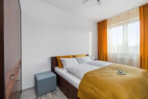 Comfortable double bed in the bedroom. 