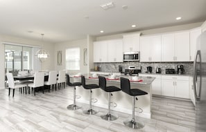 Spacious kitchen countertop, providing plenty of room for meal preparation.