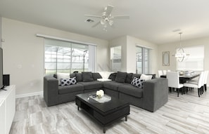 Spacious main living room with an L-shaped sofa