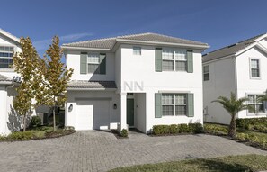 Front garden showcasing the inviting facade of the house.