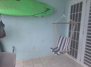 Balcony with hanging chair