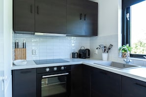 Fully equipped kitchen with modern appliances and everything you need to cook a delicious meal.