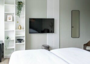 A clean and calming space, perfect for relaxation and equipped with all your essentials.