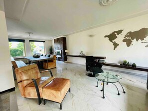 Relax in style! Our spacious living room is perfect for cozy evenings with family or friends.