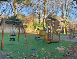 Communal garden behind the garden with playground.