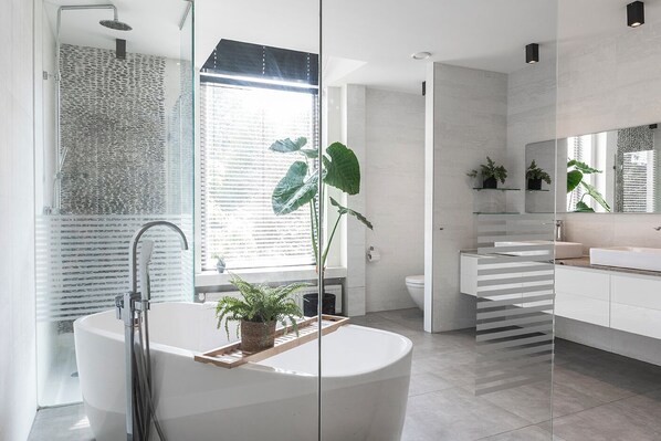 Modern and stylish bathroom with a sleek design.
