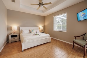 Cozy Bedroom - - Relax in this peaceful bedroom featuring a comfortable bed and soft lighting
- Room features a smart TV for entertainment, perfect for winding down
- Natural light fills the space, creating a calm and inviting atmosphere for restful nights