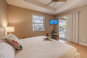 Bedroom Getaway - - Relax in this charming bedroom, complete with a double bed and a smart TV for unwinding
- Sliding door leads to an outdoor seating area, bringing the outdoors in
- Enjoy the tranquil atmosphere, perfect for peaceful mornings or restful nights