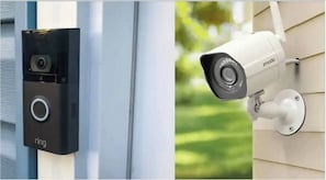 Secure entry with modern doorbell camera and surveillance system. Enjoy peace of mind with top-notch safety features in this well-maintained property.