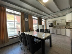 Savor your meals in the spacious dining area, designed for both family bonding and relaxed dining experiences