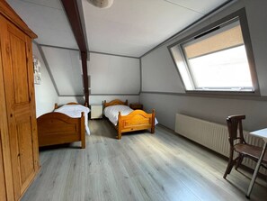 A perfect blend of comfort and style, this bedroom offers a serene atmosphere for your stay in Tilburg.