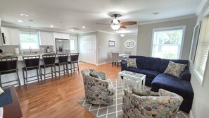 Welcome to a comfortable open kitchen, livingroom and dining area.