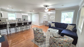 Welcome to a comfortable open kitchen, livingroom and dining area.