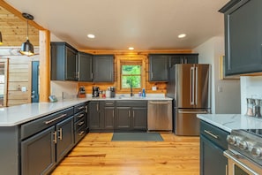Remodeled Kitchen with Cafe Appliances & Refinished Floors