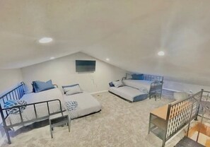 Loft (semi private 4th bedroom) sleeps 4 - two day beds and two trundles