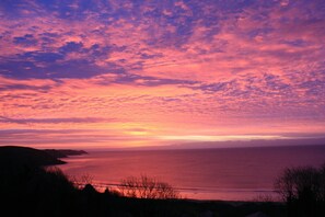 Sunset over Freshwater East Bay