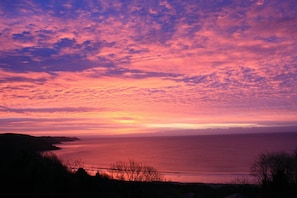 Sunset over Freshwater East Bay