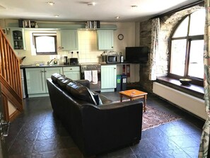 Sitting area with sofa and TV