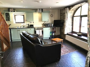 Sitting area with sofa and TV