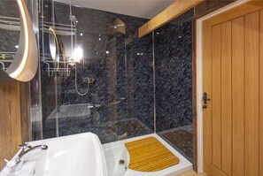 Shower enclosure and hand basin