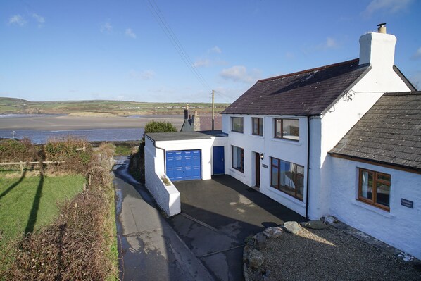 The outside of Glandwr with the estuary in the background