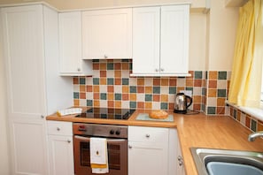 Kitchen with electric cooker