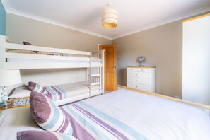 Double bed, bunk beds and chest of drawers