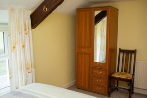 Wardrobe with a full length mirror and drawers