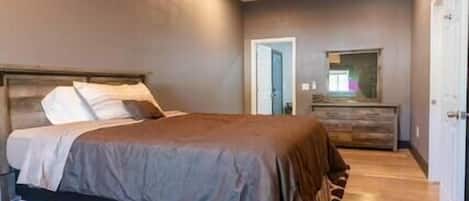 Check out this massive bedroom! All the space you need to stow your belongings out of the way