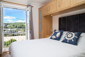 Bed 1 with Balcony looking over Aberporth Beach