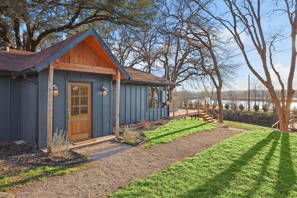 Gorgeous home with private yards and dock with access to the Brazos River that connects to Granbury Lake.
