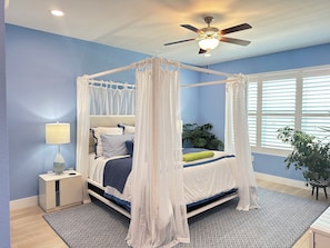 Gorgeous elegant master with canopy bed