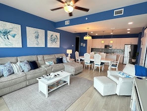 Reclining sectional, plenty of seating, open concept, modern living space