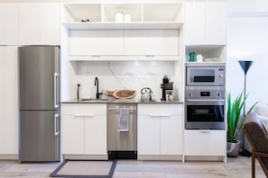 Chef's Delight: Featuring top-tier appliances and ample space, our kitchen invites you to explore Stratford's local flavors. Perfectly positioned for foodies attending the Stratford food festival or exploring downtown's eateries."