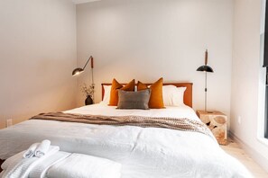 Rest in unparalleled comfort in our master suite's King bed, adorned with European linens. This prime Stratford location combines luxury with relaxation, ensuring a restorative retreat from the city’s vibrant pace