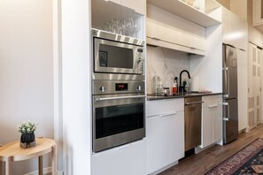 Chef's Delight: Featuring top-tier appliances and ample space, our kitchen invites you to explore Stratford's local flavors. Perfectly positioned for foodies attending the Stratford food festival or exploring downtown's eateries