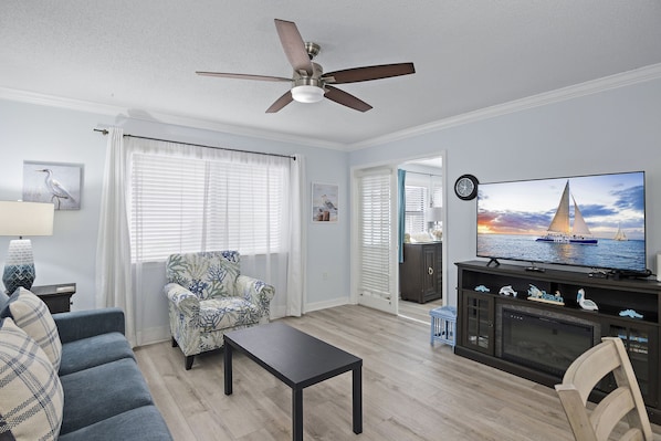 Beautifully decorated living area, w/wide-screen TV for your Entertainment.