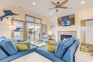 Top-Level Living Room with Deck Access