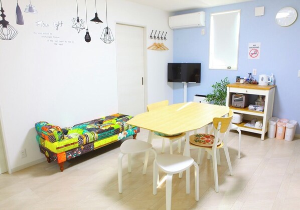 You can also watch Netflix in the cute living room.