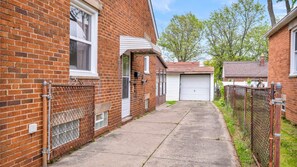 This leads to our patio and rear door—gates that, when closed, create a fully fenced space. It’s the perfect balance of openness and privacy, offering easy access while keeping things secure and peaceful.