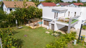 Experience luxury living in our two-story, two-bedroom villa just minutes away from the golf course in Metro Country Club.