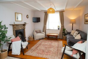 Living room with a wall mounted TV