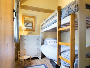 Second bedroom with bunk beds and chest of drawers