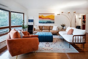 Enjoy conversations with panoramic mountain views from the upstairs living room.